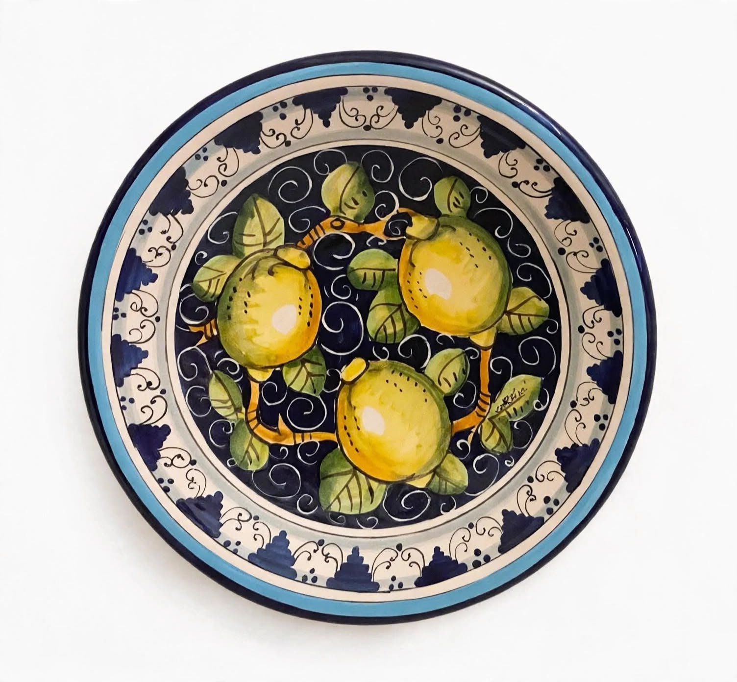 Piatto  limoni fondo blu e Monticini bordo blu 